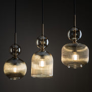 Sophia multi-arm pendant light made of amber glass in a modern style